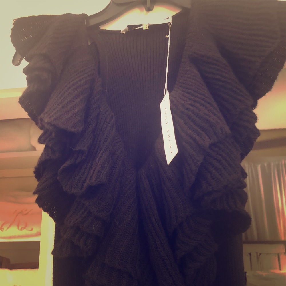 Black Trina Turk sweater knit sleeveless dress.